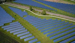 A large array of photovoltaic solar panels. (Photo by Andreas Gücklhorn on Unsplash) A large array of photovoltaic solar panels. (Photo by Andreas Gücklhorn on Unsplash)
