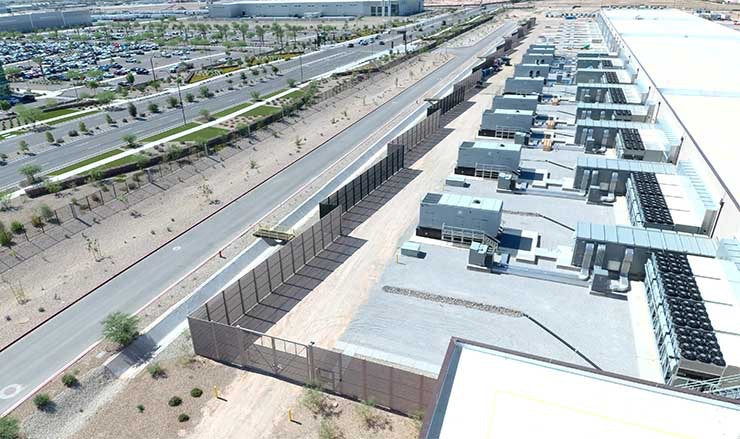 A row of backup generators at the Compass Datacenters facility in Goodyear, Ariz., one of three sites where Compass will use HVO in place of diesel to fuel its generators. (Photo: Compass Datacenters)
