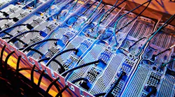 Servers immersed in a liquid cooling solution from GRC (Green Revolution Cooling). (Photo: GRC)