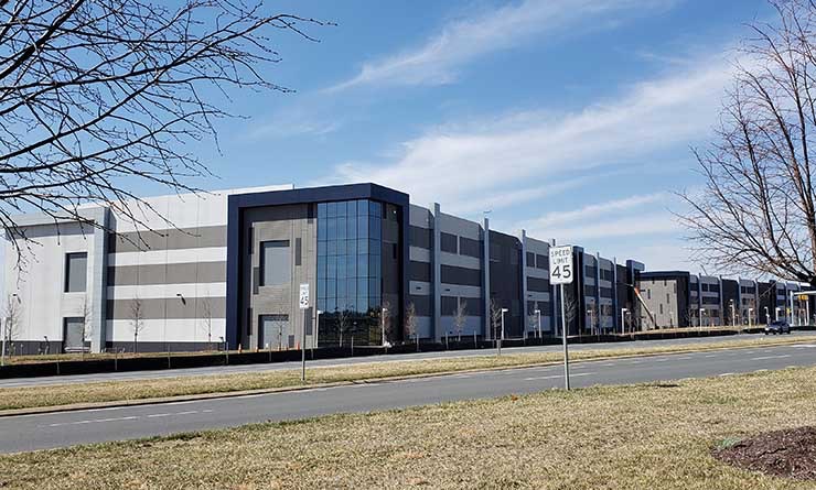 A row of data centers being built by Edgecore Internet Real Estate, one of the new platforms backed by global investors, in Sterling, Virginia. (Photo: Rich Miller)