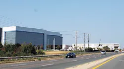 Two huge new data centers in Ashburn, Virginia, built by Digital Realty (left) and CloudHQ. (Photo: Rich Miller)