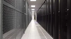 A row of cabinets and a colocation cage in a TierPoint data center in Pennsylvania. (Photo: Rich Miller)