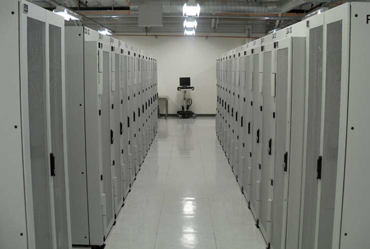 Rows of high-density racks inside Colovore in Santa Clara, which uses water-chilled cooling doors. (Photo: Rich Miller)