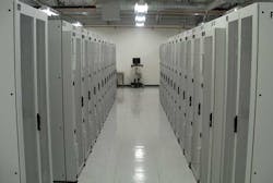 Rows of high-density racks inside Colovore in Santa Clara, which uses water-chilled cooling doors. (Photo: Rich Miller) Rows of high-density racks inside Colovore in Santa Clara, which uses water-chilled cooling doors. (Photo: Rich Miller)