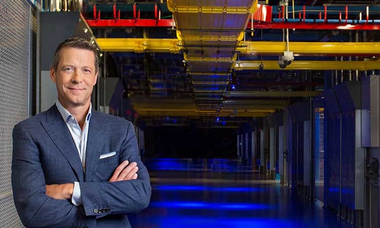 Equinix CEO Charles Meyers in one of the company&rsquo;s familiar blue-lit data centers. (Photo: Equinix)