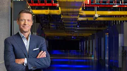 Equinix CEO Charles Meyers in one of the company’s familiar blue-lit data centers. (Photo: Equinix)