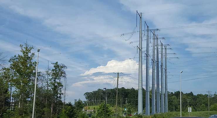 High-capacity power lines in Manassas, support data center development in Prince William County. ( Photo: Rich Miller)