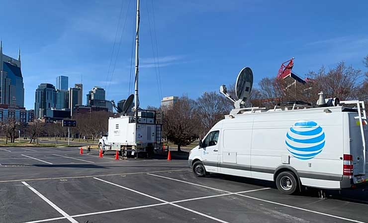AT&T deploys a temporary cell tower in Nashville, with the company&rsquo;s iconic office tower visible at left. A Christmas Day explosion damaged the company&rsquo;s central office on Second Avenue, causing widespread network outages. (Image: AT&T)