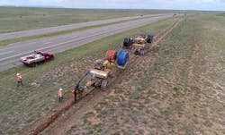 A team of engineers laying long-haul dark fiber in a trench for a Facebook network deployment. (Photo: Facebook) A team of engineers laying long-haul dark fiber in a trench for a Facebook network deployment. (Photo: Facebook)