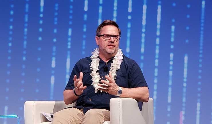 Douglas Adams, CEO of NTT Global Data Centers, Americas, discusses the new brand Monday at the Pacific Telecommunications Council conference in Hawaii. (Photo: Rich Miller)