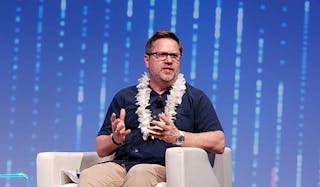 Douglas Adams, CEO of NTT Global Data Centers, Americas, discusses the new brand Monday at the Pacific Telecommunications Council conference in Hawaii. (Photo: Rich Miller)