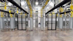 A data hall in an Aligned Energy data center in Dallas, ready for racks. The rear wall of the hall features Aligned&rsquo;s Delta 3 cooling system. (Photo: Aligned Energy)