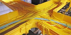 Network cabling fills fiber trays inside an Equinix data center. (Photo: Equinix)