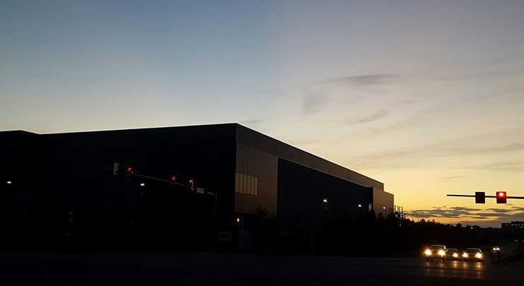 The sun sets over a new data center on the Digital Realty campus in Ashburn, Virginia. (Photo: Rich Miller)