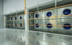 A fan wall inside the cooling plenum in a Compass Datacenters facility in Allen, Texas. The fans are fed by cool air from a Kyoto Cooling unit. (Image: Compass Datacenters) A fan wall inside the cooling plenum in a Compass Datacenters facility in Allen, Texas. The fans are fed by cool air from a Kyoto Cooling unit. (Image: Compass Datacenters)