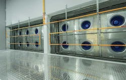 A fan wall inside the cooling plenum in a Compass Datacenters facility in Allen, Texas. The fans are fed by cool air from a Kyoto Cooling unit. (Image: Compass Datacenters)