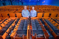 Dr. Matthew Lamont (left), DownUnder GeoSolutions (DUG) managing director, and Phil Schwan, DUG CTO, stand among the cooling tanks that make up the “Bubba” supercomputer at the Houston Skybox data center. (Credit: DownUnder GeoSolutions) Dr. Matthew Lamont (left), DownUnder GeoSolutions (DUG) managing director, and Phil Schwan, DUG CTO, stand among the cooling tanks that make up the “Bubba” supercomputer at the Houston Skybox data center. (Credit: DownUnder GeoSolutions)