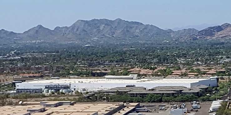 An aerial view of Iron Mountain&rsquo;s Phoenix data center, against the backdrop of nearby mountains. (Photo: Rich Miller)