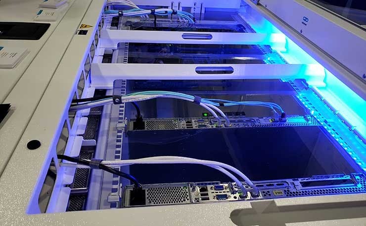 A Submer Immersion Cooling enclosure on display at the recent Gartner Infrastructure and Operations Conference in Las Vegas. (Photo: Rich Miller)