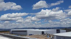 A cloud-filled sky above a Facebook cold storage data center, framed by the mountains of central Oregon. (Photo: Rich Miller) A cloud-filled sky above a Facebook cold storage data center, framed by the mountains of central Oregon. (Photo: Rich Miller)