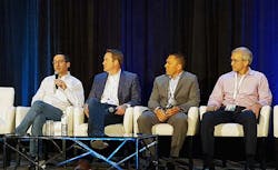 Jonathan Atkin of RBC Capital (at left) speaks on an investment panel at the Edge Congress in Austin. Other panelists (left to right) include Phil Kelley from Crown Castle, Christof Hammerli of Landmark Infrastructure, and DataBank CEO Raul Martynek. (Photo: Rich Miller)