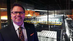 RagingWire CEO Douglas Adams on the catwalk corridor overlooking the data hall in the company’s CA3 data center in Sacramento. (Photo: Rich Miller)