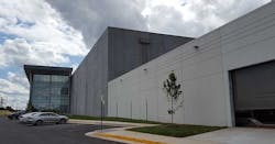 The front facade of Sterling V, showing the glass exterior on the three-story Class A office space. (Photo: Rich Miller) The front facade of Sterling V, showing the glass exterior on the three-story Class A office space. (Photo: Rich Miller)