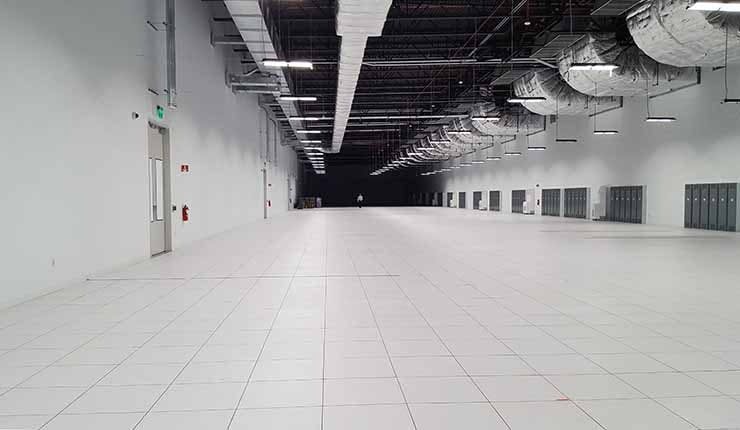 A look at the length of the 5 megawatt, 34,000 square foot data hall inside RagingWire&rsquo;s TX1 data center in Garland, Texas. (Photo: Rich Miller)