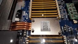 A Project Olympus server design with an optional remote heat sink, which can be used to incorporate water-cooling, on display at the Microsoft booth at the the Open Compute Summit 2018, brings water to the chip to handle high-density cooling. (Photo: Rich Miller) A Project Olympus server design with an optional remote heat sink, which can be used to incorporate water-cooling, on display at the Microsoft booth at the the Open Compute Summit 2018, brings water to the chip to handle high-density cooling. (Photo: Rich Miller)