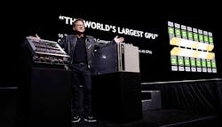 NVIDIA founder and CEO Jensen Huang shows off new hardware for the DGX-2, the upgraded version of the company’s desktop supercomputer. (Photo: NVIDIA Corp.) NVIDIA founder and CEO Jensen Huang shows off new hardware for the DGX-2, the upgraded version of the company’s desktop supercomputer. (Photo: NVIDIA Corp.)