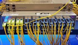 At Open Compute, Intel and Barefoot Networks demonstrated a programmable 6.5 Tb/s Wedge 100 switch using 65 silicon photonics transceivers. (Photo: Rich Miller) At Open Compute, Intel and Barefoot Networks demonstrated a programmable 6.5 Tb/s Wedge 100 switch using 65 silicon photonics transceivers. (Photo: Rich Miller)