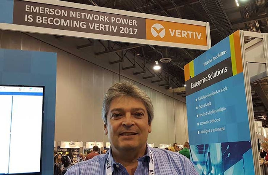 Enzo Greco, VP and General Manager of Data Center Solutions at Vertiv, with the company&rsquo;s new branding at the Gartner data center conference. (Photo: Rich Miller)