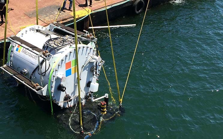 Microsoft&rsquo;s experimental underwater data center is lowered into the ocean. The company provided an update at the Datacenter Dynamics Enterprise Conference. (Photo: Microsoft Corp.)