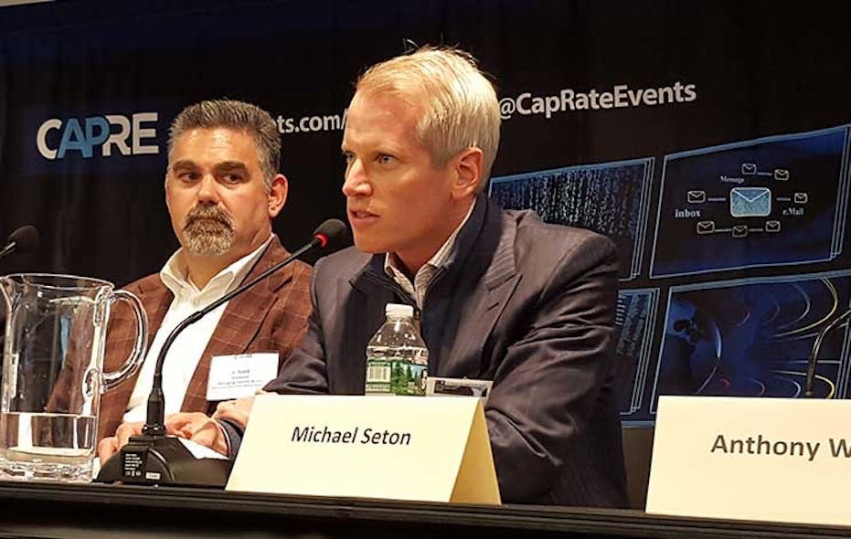 Carter Validus CEO Michael Seton (right) discusses data center financing at the recent New York Data Center Summit. At left is Todd Raymond, CEO of 1547 Critical Systems Realty. (Photo: Rich Miller)