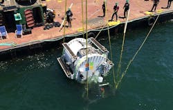 Microsoft’s experimental underwater data center, the Leona Philpott, is lowered into the ocean in August 2015. (Photo: Microsoft Corp.) Microsoft’s experimental underwater data center, the Leona Philpott, is lowered into the ocean in August 2015. (Photo: Microsoft Corp.)