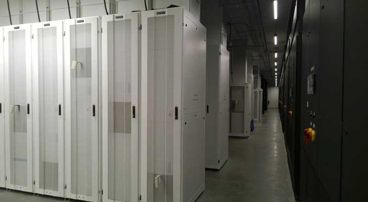 A data hall inside the DuPont Fabros ACC7 data center in Ashburn, Virginia. The company is updating its data center design to offer variable power density and reliability. (Photo: Rich Miller)