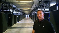Facebook Datacenter Manager Keven McCammon inside one of the massive data halls in the company&rsquo;s campus in North Carolina. (Photo: Rich Miller)