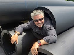 Quantum Loophole CEO Josh Snowhorn testing one of the giant conduits that will house fiber for the QLoop, the company's fiber ring connecting the new campus to Data Center Alley in Northern Virginia. Quantum Loophole CEO Josh Snowhorn testing one of the giant conduits that will house fiber for the QLoop, the company's fiber ring connecting the new campus to Data Center Alley in Northern Virginia.