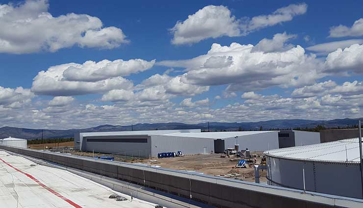 A sky full of clouds above a Meta data center campus in Oregon.