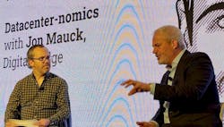 Jon Mauck, Senior Managing Director at DigitalBridge Investment Management (right), discusses the current economic client with DatacenterDynamics CEO George Rockett at the recent DCD Connect New York event. Jon Mauck, Senior Managing Director at DigitalBridge Investment Management (right), discusses the current economic client with DatacenterDynamics CEO George Rockett at the recent DCD Connect New York event.