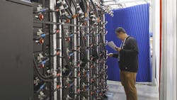 Liquid cooling infrastructure integrated with Meta's OpenRack system in a data center setting. Liquid cooling infrastructure integrated with Meta's OpenRack system in a data center setting.