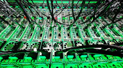 Servers immersed in liquid coolant in an immersion cooling research lab at Intel.