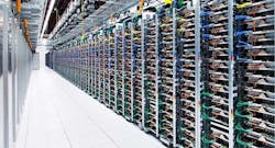 A long row of racks housing servers inside the Google data center in Mayes County, Oklahoma.