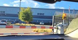 Rental car&apos;s eye view of entry into the Flexential Dallas-Plano Data Center at 3500 East Plano Parkway in Plano, Texas.