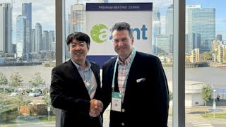 Edged Energy Global Account Executive Ron Kolber signs carrier agreement with Axent CCO Peng Yan.