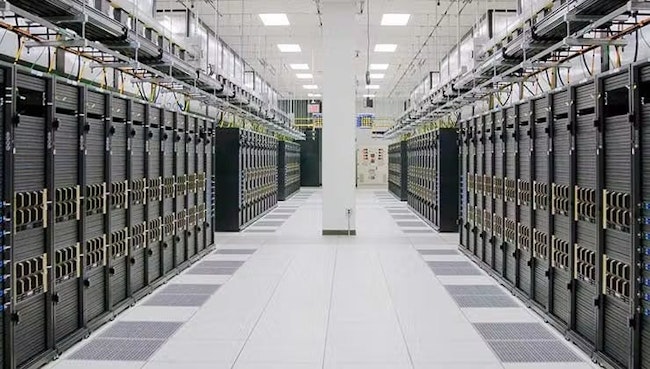 A row of racks for the Meta AI Research SuperCluster (RSC), a supercomputer built to enable new AI models. Each rack contains two NVIDIA DGX A100 systems.