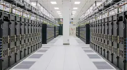 A row of racks for the Meta AI Research SuperCluster (RSC), a supercomputer built to enable new AI models. Each rack contains two NVIDIA DGX A100 systems.