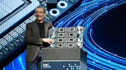 Intel CEO Pat Gelsinger with a blade of Gaudi 3 AI accelerators, at the Intel Vision 2024 Conference.