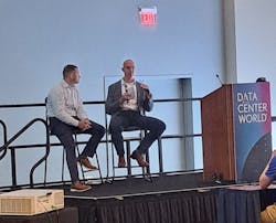 Chris McLean (L) and Luke Kipfer (R) take the stage at Data Center World 2024,