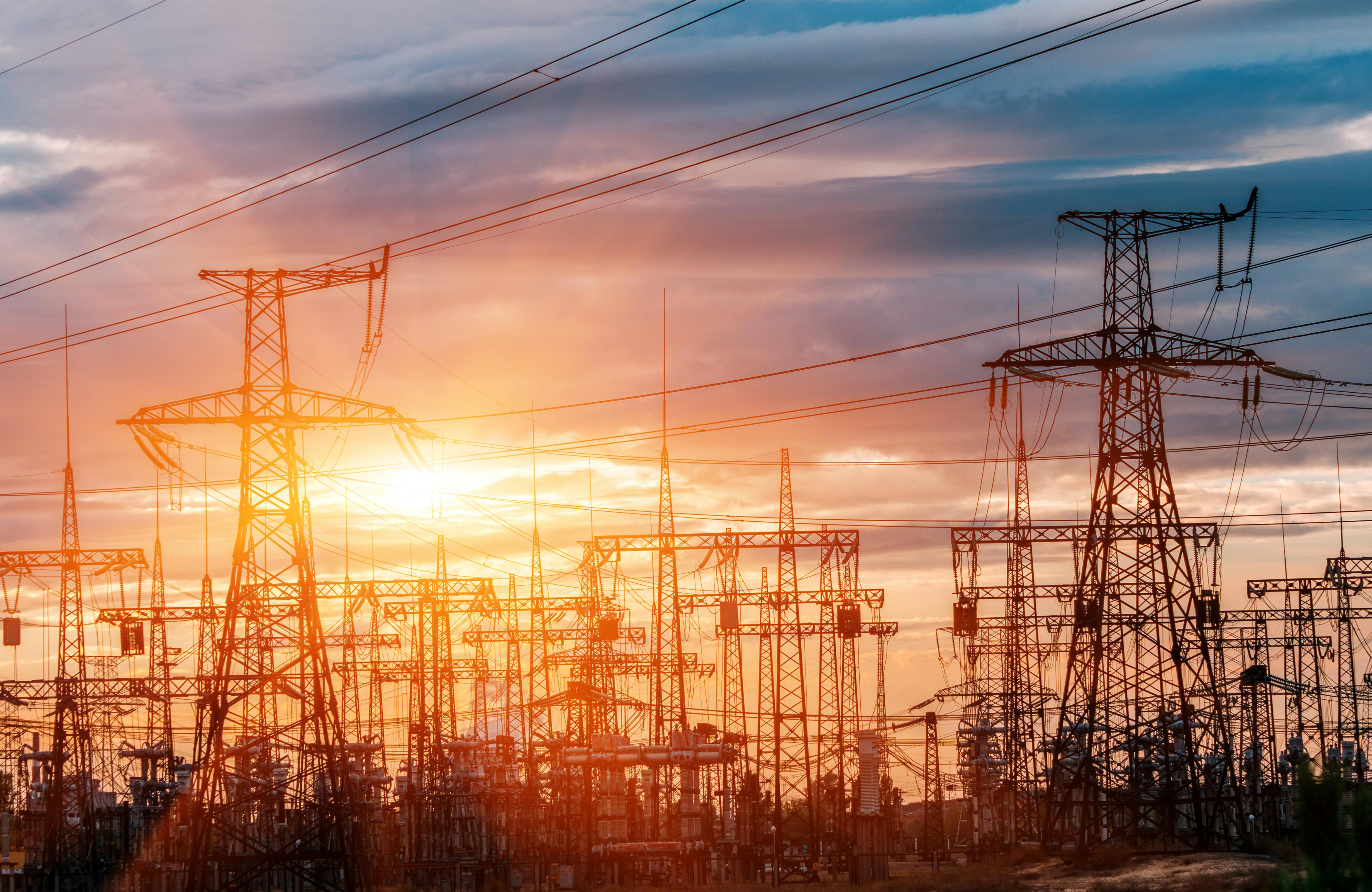 Electricity distribution substation with power lines and transformers